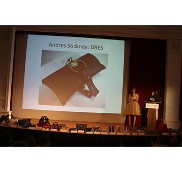 Christina Polychroni of Korres Natural Products presenting the Winner of the Best Green Handbag, Andres Stickney for DRES