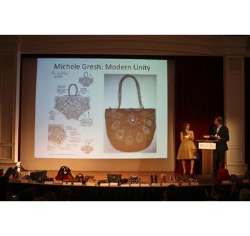 Finalist Michele Gresh of  Modern Unity with her sketch and finished created version with her prize as a finalist to create her bag with iSwarovskii Crystallizedtm Elements for free