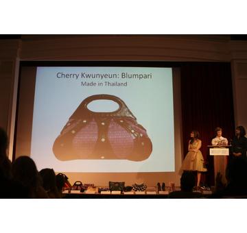 Presenter Kendall Farrell announcing the winner of the Most Socially Responsible Handbag, Cherry Kwunyeun of Blumpari