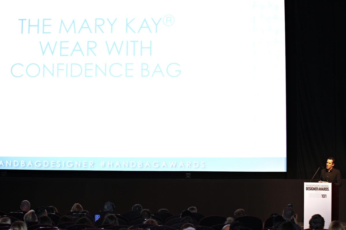 Steven Webster presenting Mary Kay Wear with Confidence Bag