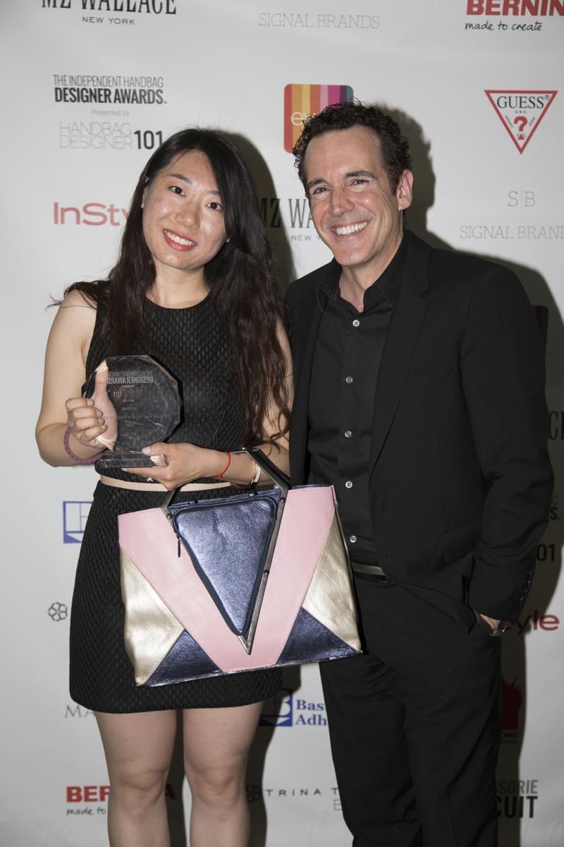 Steven Webster with Zhe Liu Winner of Mary Kay Handbag 