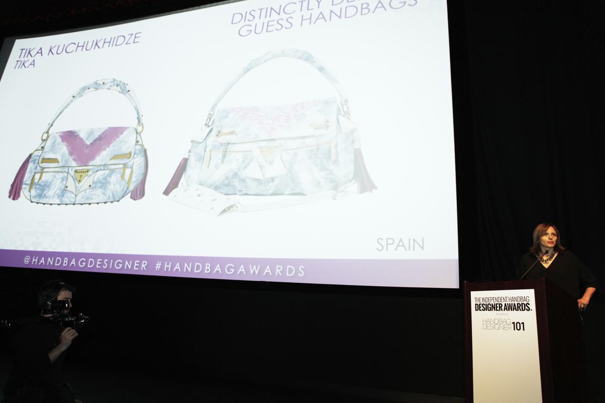 Tika Kuchukhidze of TIKA, Winner accepting her awards for Distinctively Denim by Guess Handbags